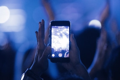 Holding a black android smartphone
